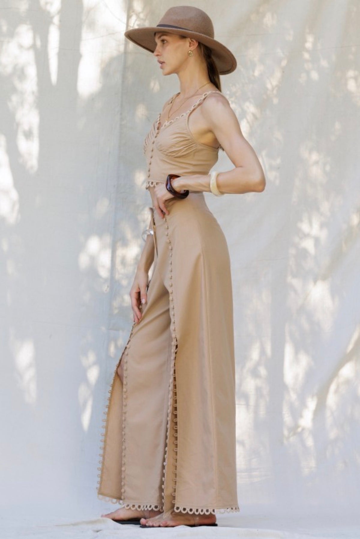 EMBROIDERED HEM WIDE-LEG PANTS WITH
BUTTON DETAIL