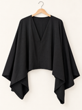 cape-style black blouse