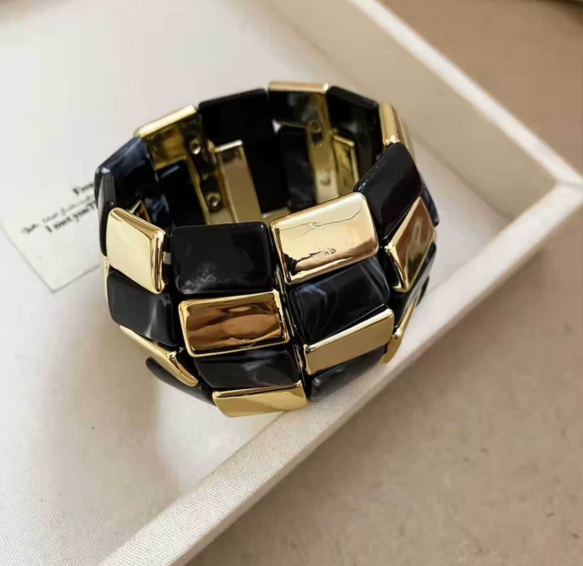 Black/gold bracelet