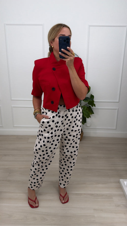 asymmetric/red jacket