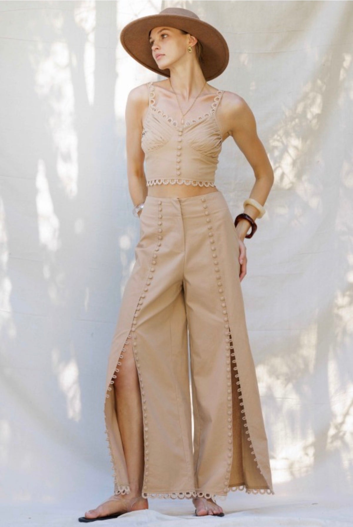 EMBROIDERED HEM WIDE-LEG PANTS WITH
BUTTON DETAIL