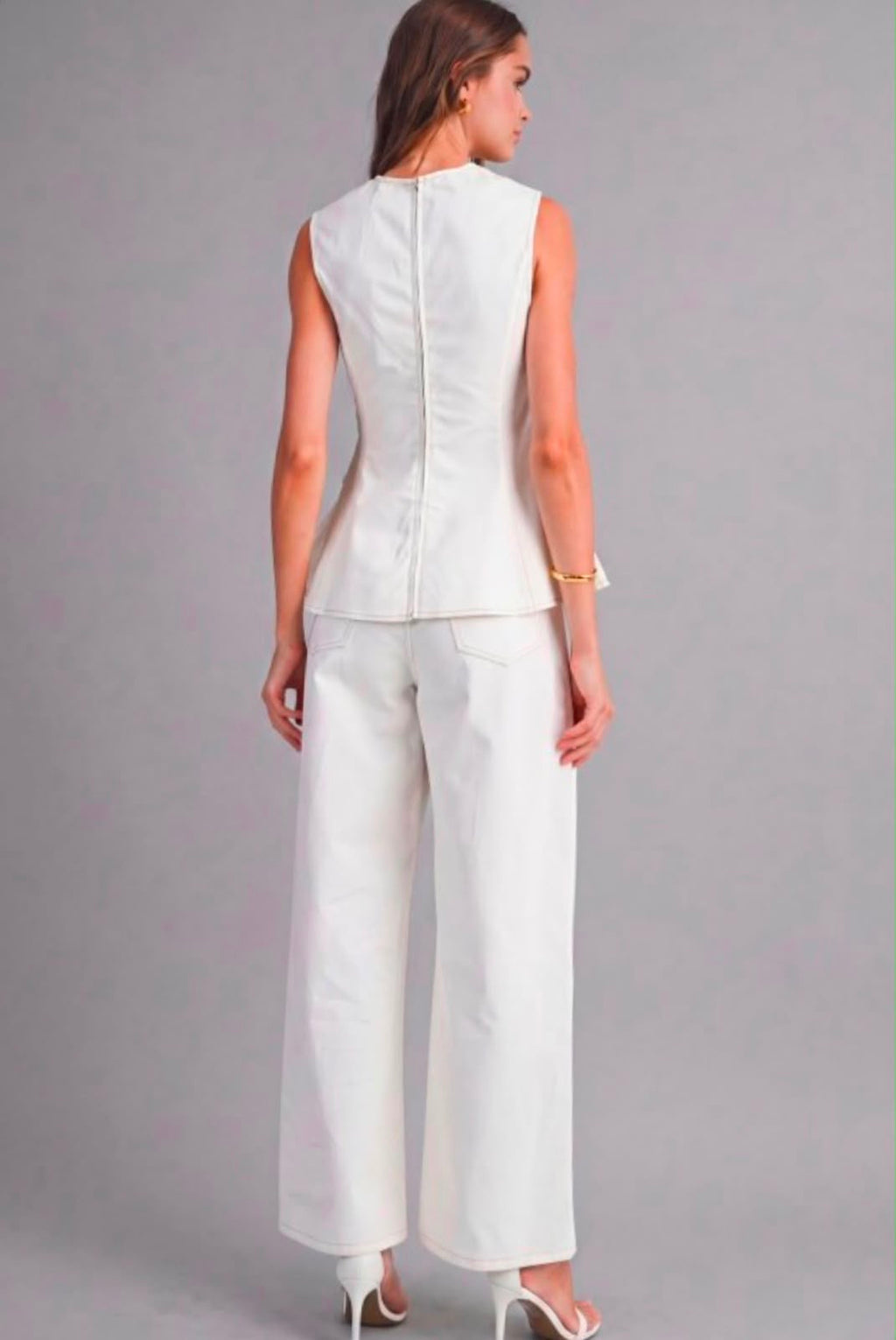 Sleeveless structured peplum top
