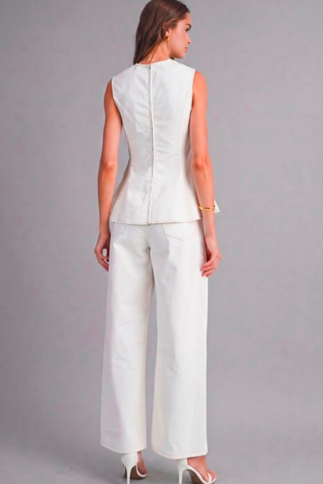 Sleeveless structured peplum top