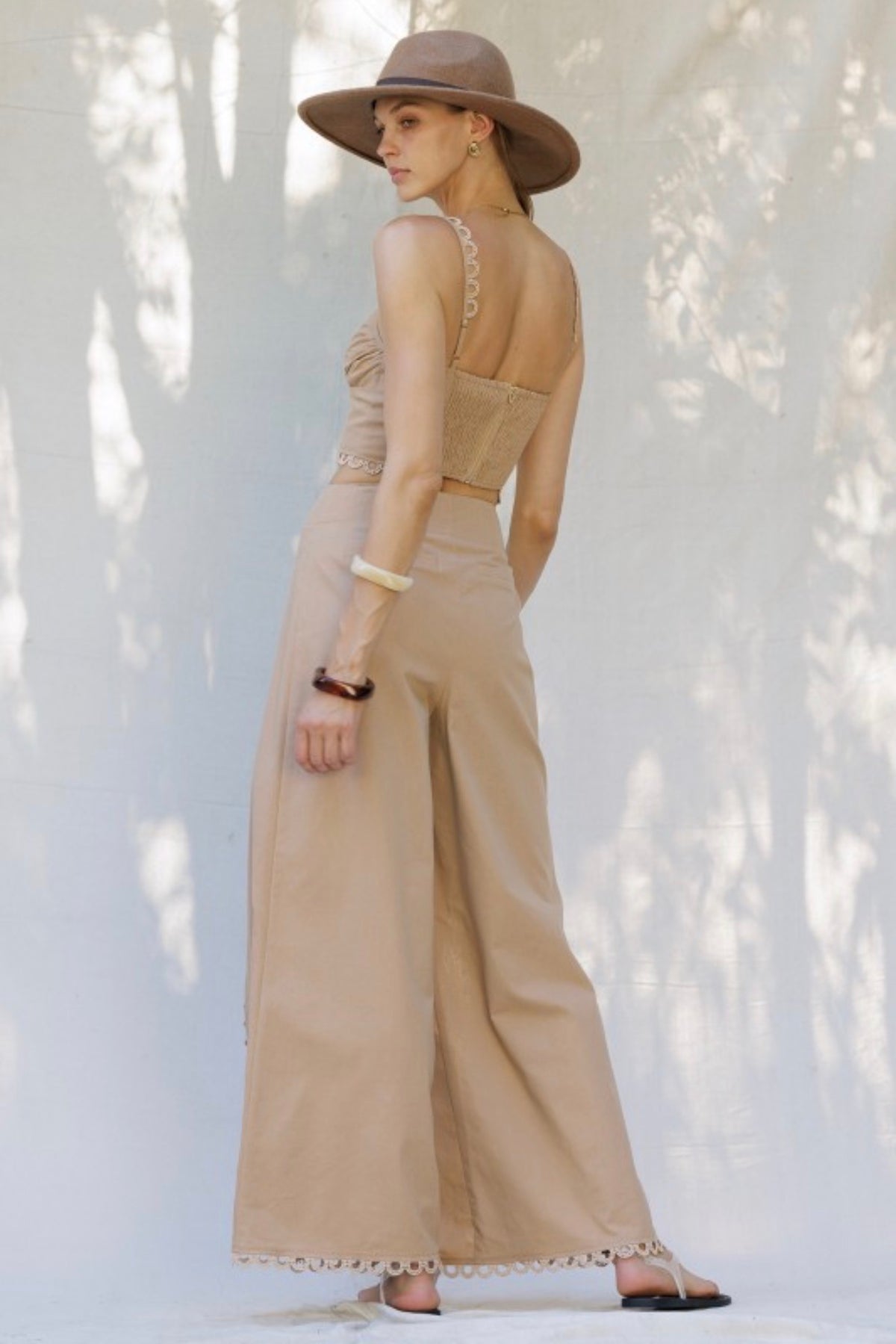 EMBROIDERED HEM WIDE-LEG PANTS WITH
BUTTON DETAIL